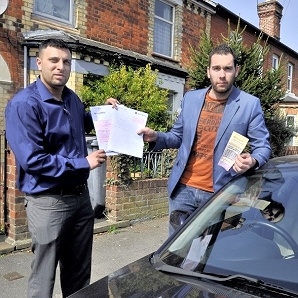 Council Candidate Imraan Ishtiaq, left, supports Gareth Aldridge over his permit